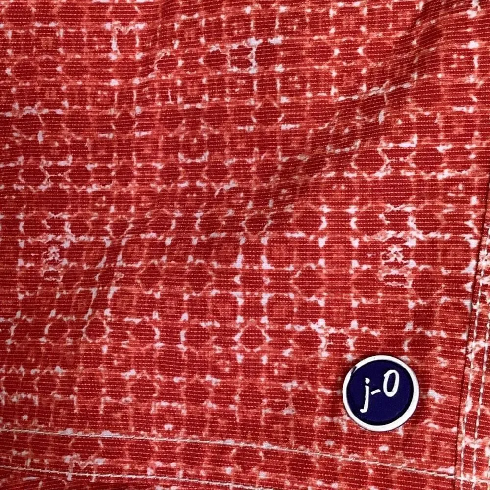 New. Johnnie-O red swim shorts. Small. Retails $89